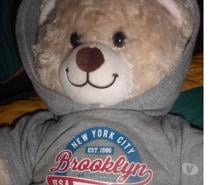 peluche petit ours habillé