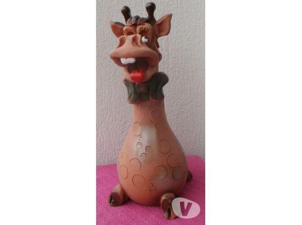 Décoration - art Tarn-et-Garonne Montauban - 82000 - Photos Vivastreet VACHE TIRELIRE en terre cuite ou argile Hauteur 23 cm 