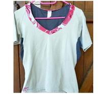Maillot de sport féminin Marque: Décathlon. Taille: L.