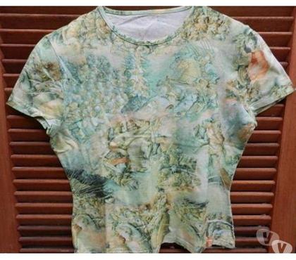 Vêtements occasion Cosnac Corrèze - Photos Vivastreet Tee Shirt vert imprimé. Taille 40 élastis.
