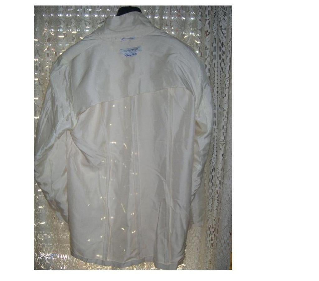 Vêtements occasion Bouches-du-Rhône Aix en Provence - Photos Vivastreet VESTE DAME MARQUE MARINA RINALDI 100% SOIE