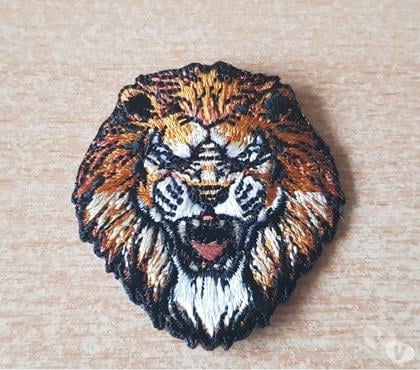Accessoires - Bagagerie Carnon Hérault - Photos Vivastreet petit écusson brodé tête de lion 5x4,5 cm thermocollant