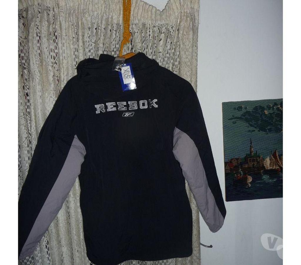 Vêtements occasion Bouches-du-Rhône Aix en Provence - Photos Vivastreet VESTE COUPE VENT REEBOK HOMME XL COULEUR NOIR GRIS BLANC