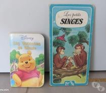2 livres : 1 Winnie et 1 petits singes