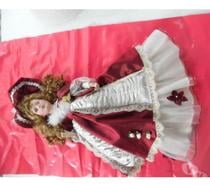 Pour collectionneur ou amateur Poupée en porcelaine de 60