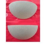 2 appliques en terre cuite gris clair en très bon état