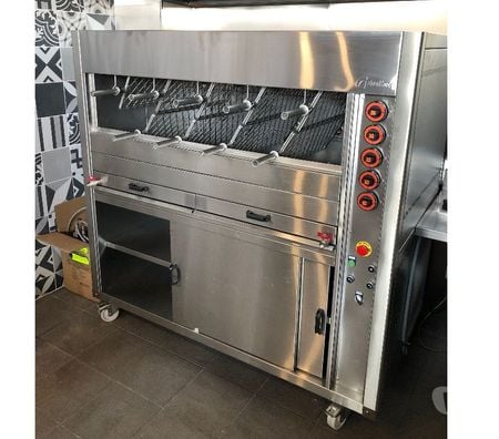 Matériel Paris Paris 1er ardt - 75001 - Photos Vivastreet Rôtissoire au gaz 9 grils rotatifs - 27 poulets ouverts