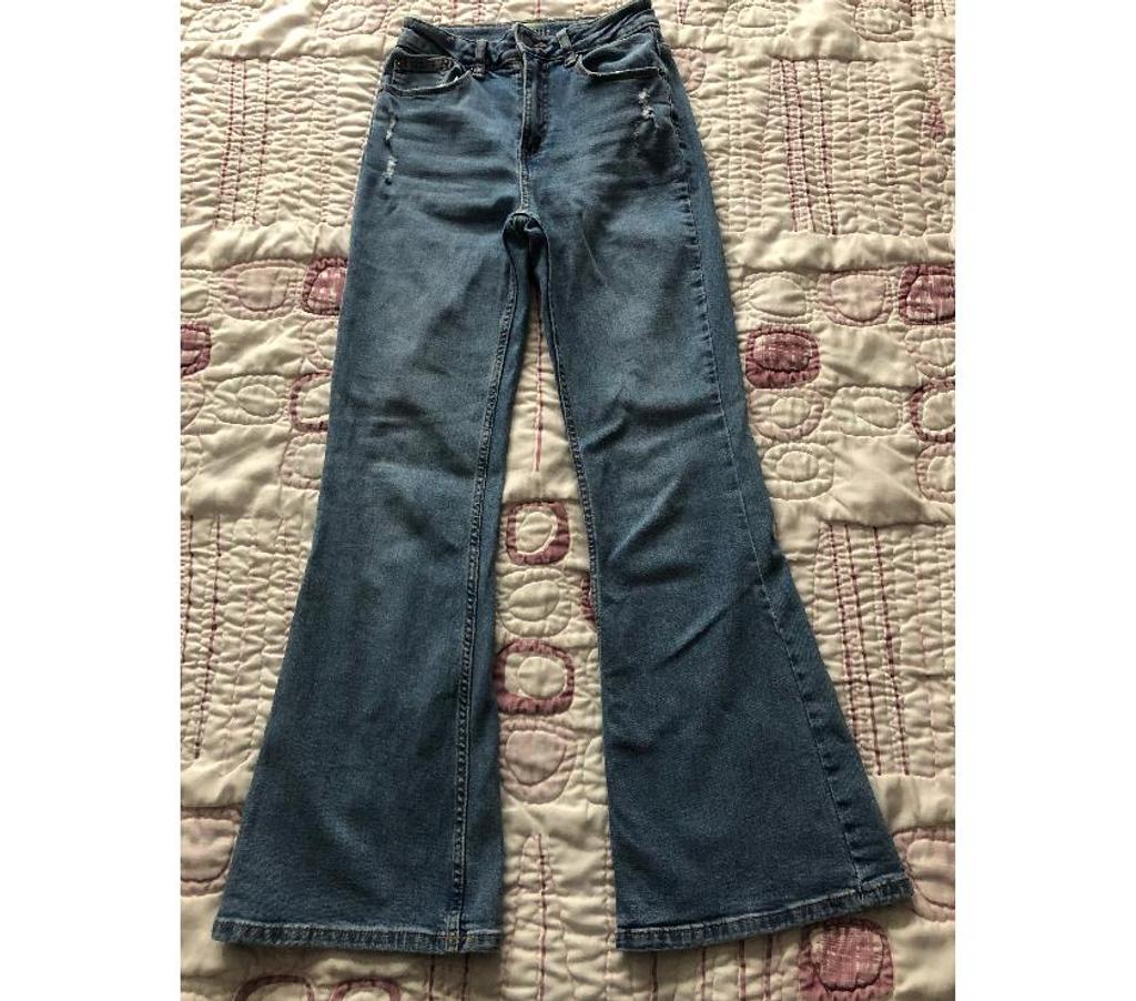 Vêtements occasion Nord Wasquehal - 59290 - Photos Vivastreet Jean flare KIABI fille (taille 32)