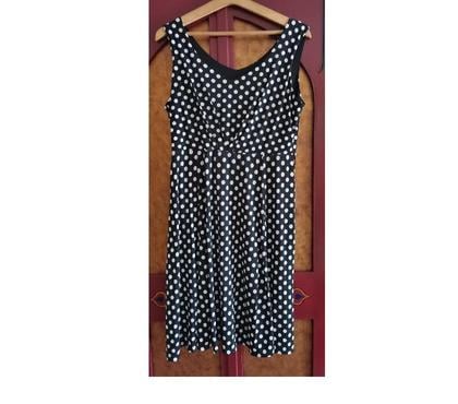 Vêtements occasion La Motte Servolex Savoie - Photos Vivastreet Robe courte noir à pois blancs