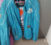 Vends Blouson cuir bleu.