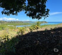 A VENDRE TERRAIN 1600 M2 TITRE BORNE A NOSY BE