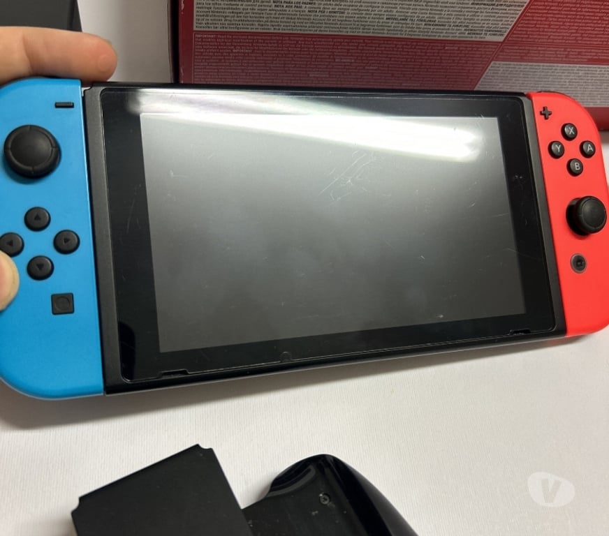Jeux vidéo - consoles Gironde Bruges - 33520 - Photos Vivastreet Nintendo Switch Bleu Rouge Néon Version V2 complète