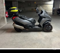 Mp3 metropolis 400 rs