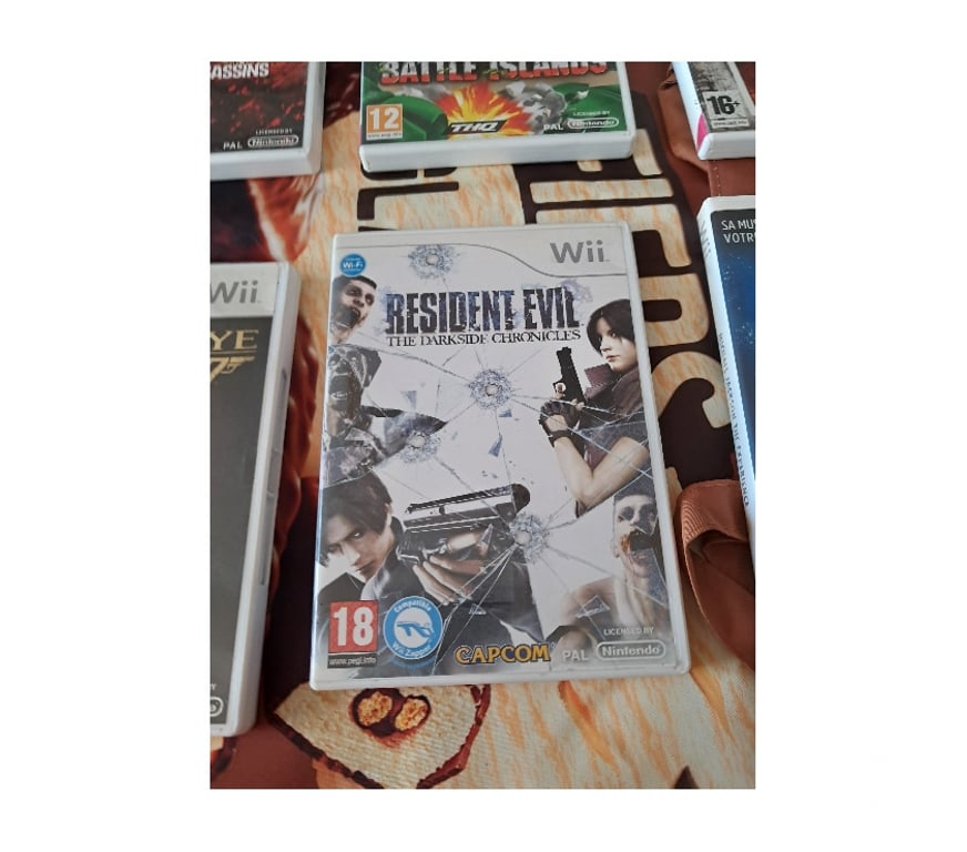Jeux vidéo - consoles Moselle Semecourt - 57280 - Photos Vivastreet Jeu Wii Resident Evil Dark Side video manga anime chronicle