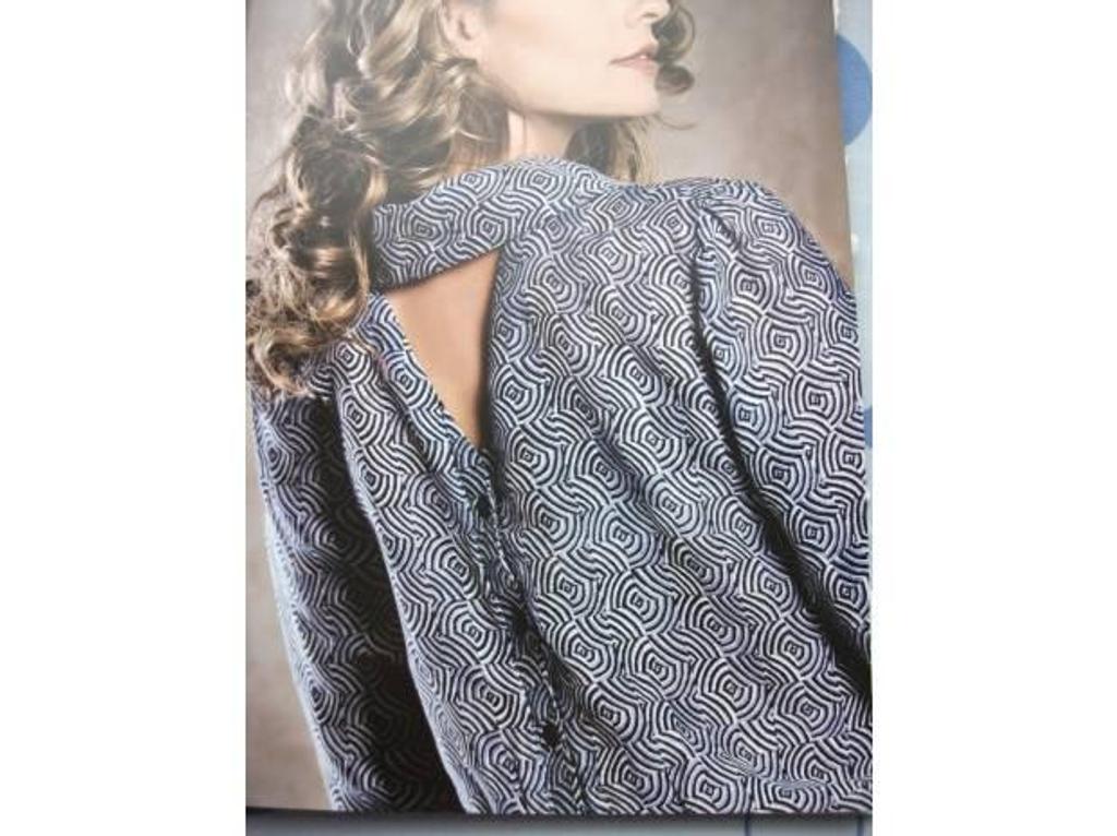 Vêtements occasion Haut-Rhin Balgau - 68740 - Photos Vivastreet très joli chemisier sexy taille 44 TANAIS (Allande)