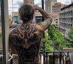 Straight fit tattooed male.