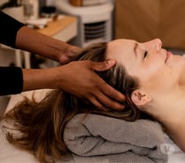 Relaxing body massage by male massage therapist beven