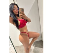 Fiery Brazilian brunette, new in town.