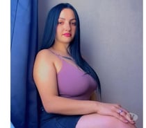 Bella brunette queen in the bed