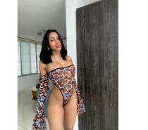 Young and beautiful brunette only a few days in this city