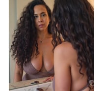 Mature Venezuelan woman with big natural breasts