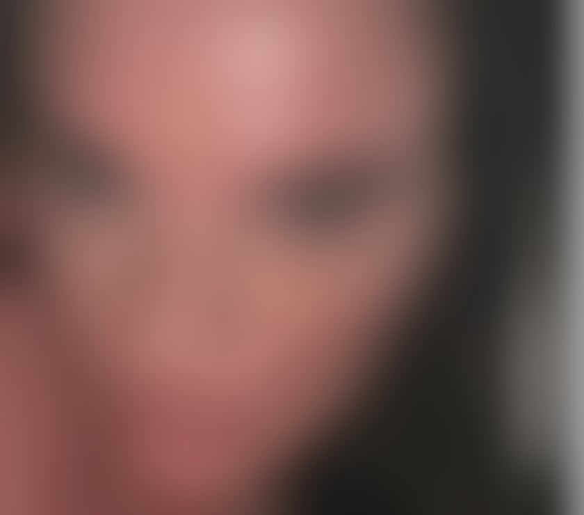 Blue eyed busty MILF