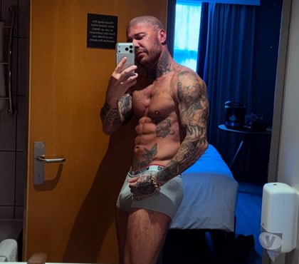 Photos for Tattooed British man