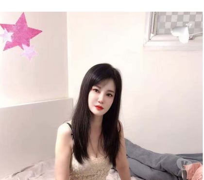 Photos for Young Asian woman arriving for the first time