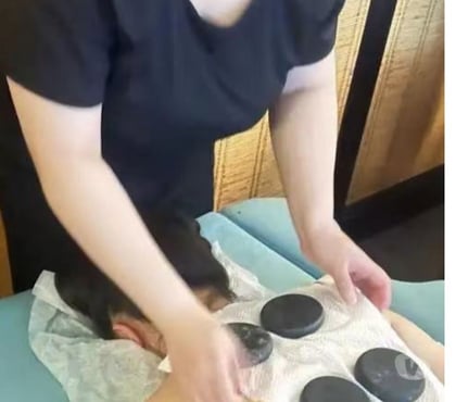 Photos for I provide deep tissue massage using hot stones and hot oil i