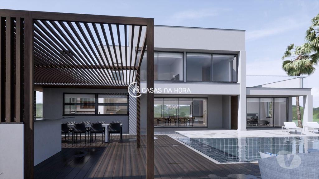 Apartamentos a venda Lagos - Fotos para Moradia de luxo T4 de arquitetura com piscina, jardim e garagem
