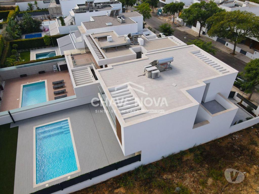 Apartamentos a venda Loulé - Fotos para Moradia V4 nova em zona residencial de Quarteira. (VLM 00242)
